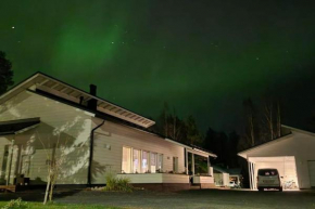 Moderni talo lähellä joulupukkia, Rovaniemi